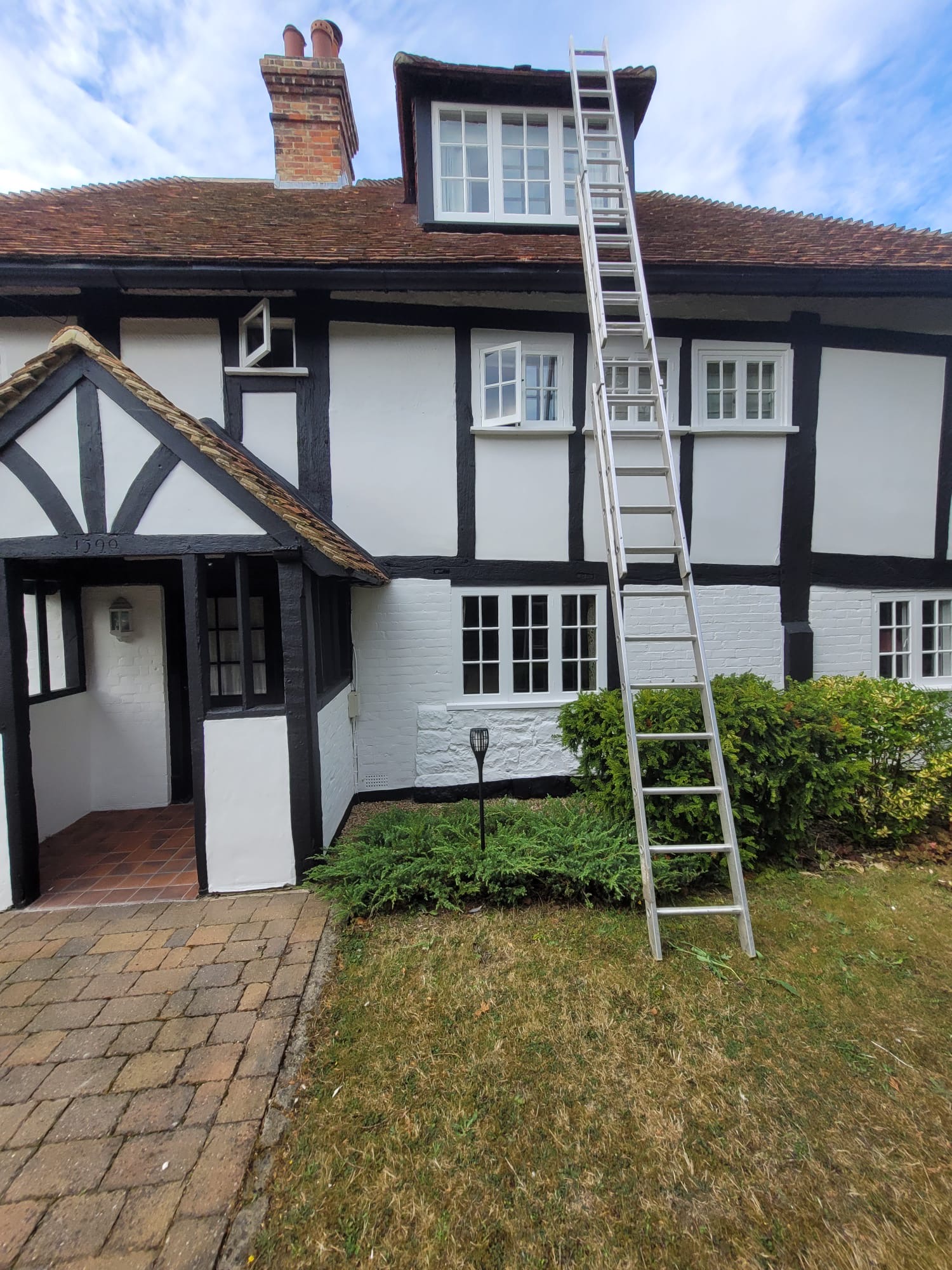 Tudor property exterior painting by DecorInnovations